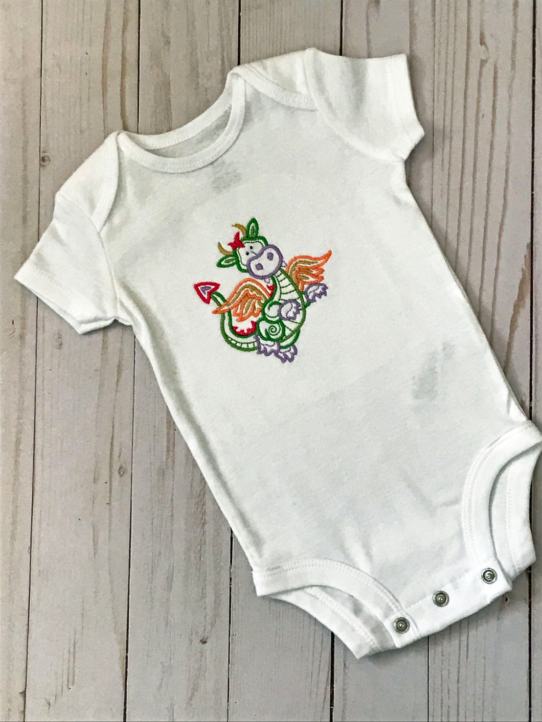 Little Dragon Embroidered on a Carter Onesie