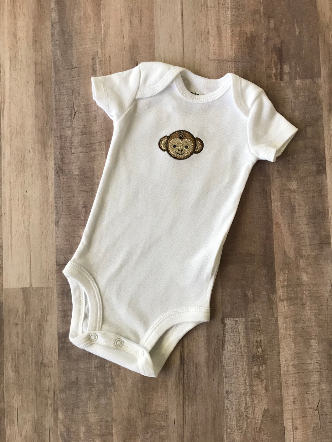 Monkey Face Embroidered on a Carter Onesie